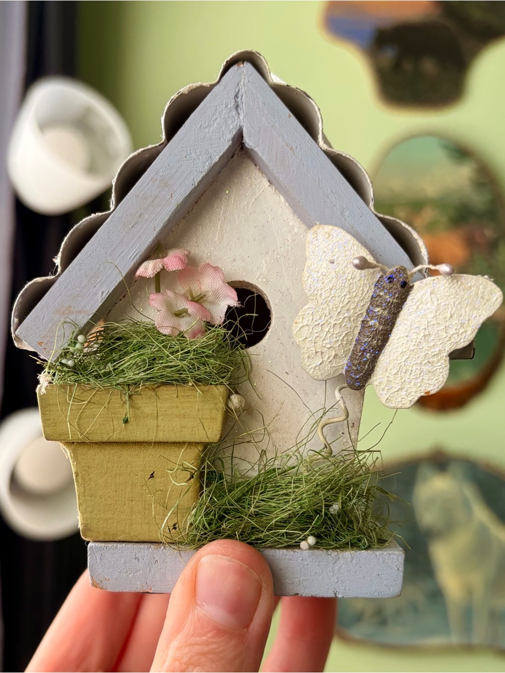 Handcrafted Pastel Birdhouse Wall Decor with Green Planter and Butterfly Accent